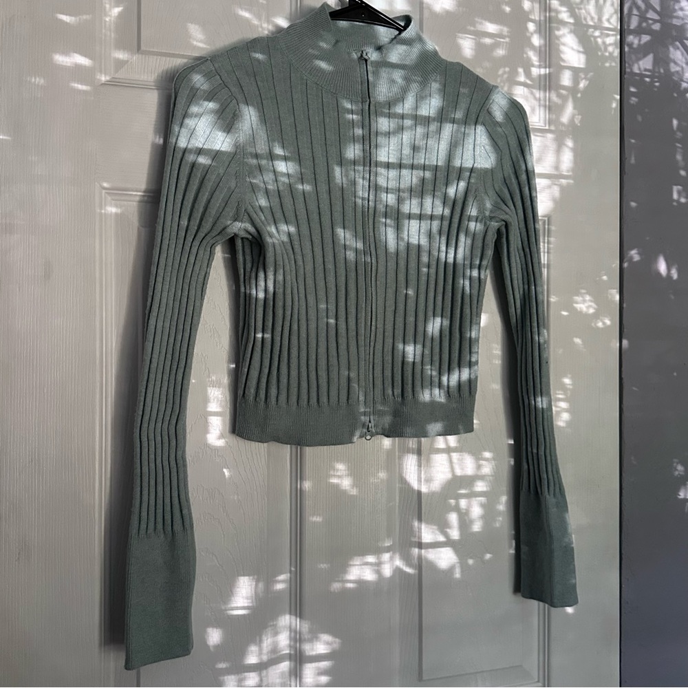 - [ ] Baby Blue Tennis Jacket